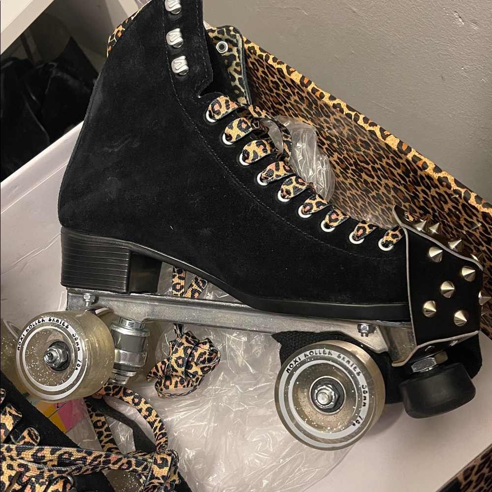 Moxi Panther - Black RollerSkates w/ Leopard Laces & Spiked Toe Caps
